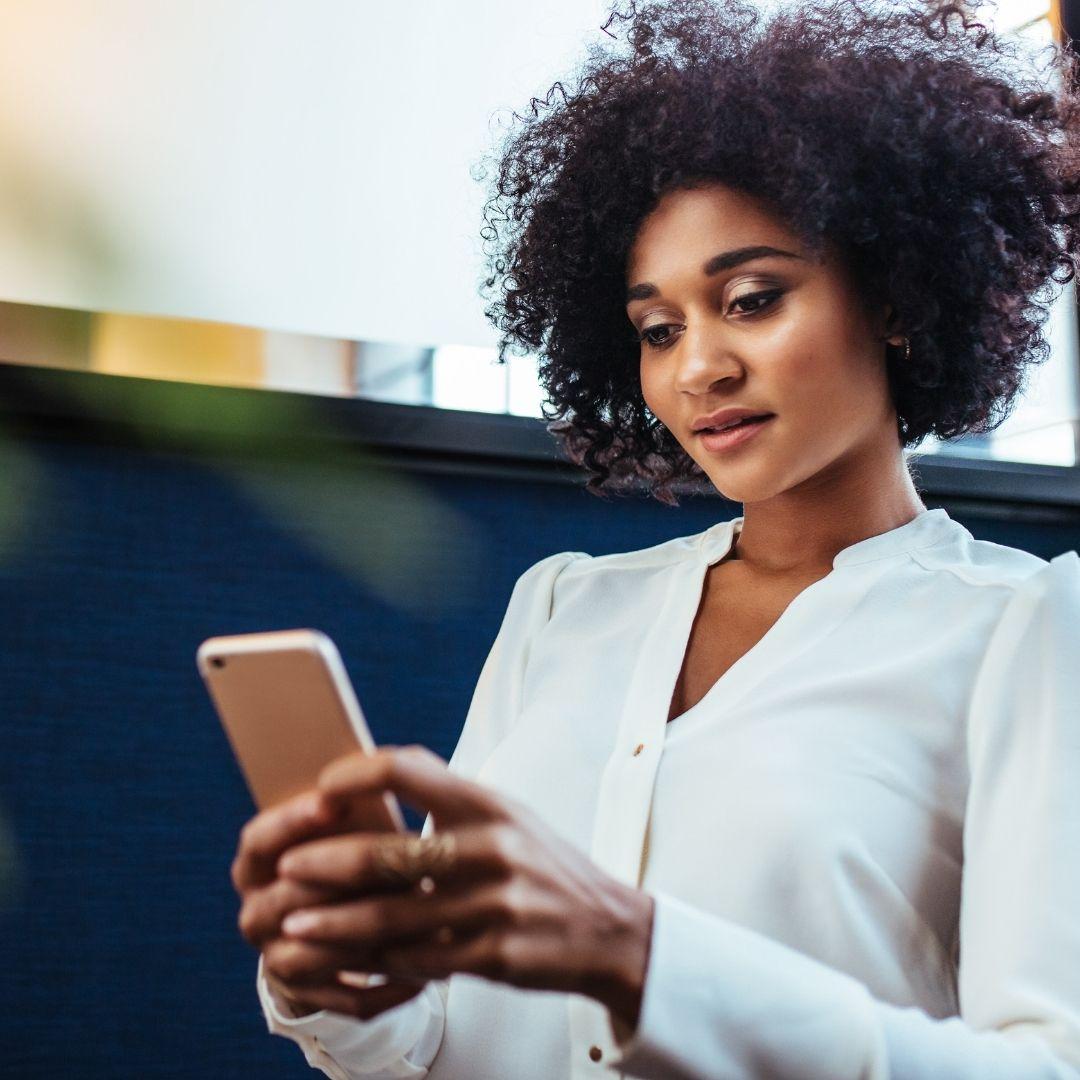 woman looking at phone