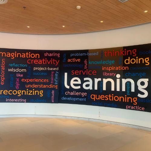 How Custom Signage and Printed Materials Create Welcoming Campuses