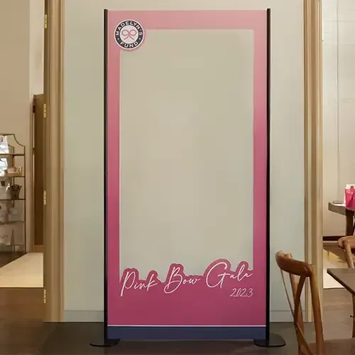 A huge, pink frame with the words