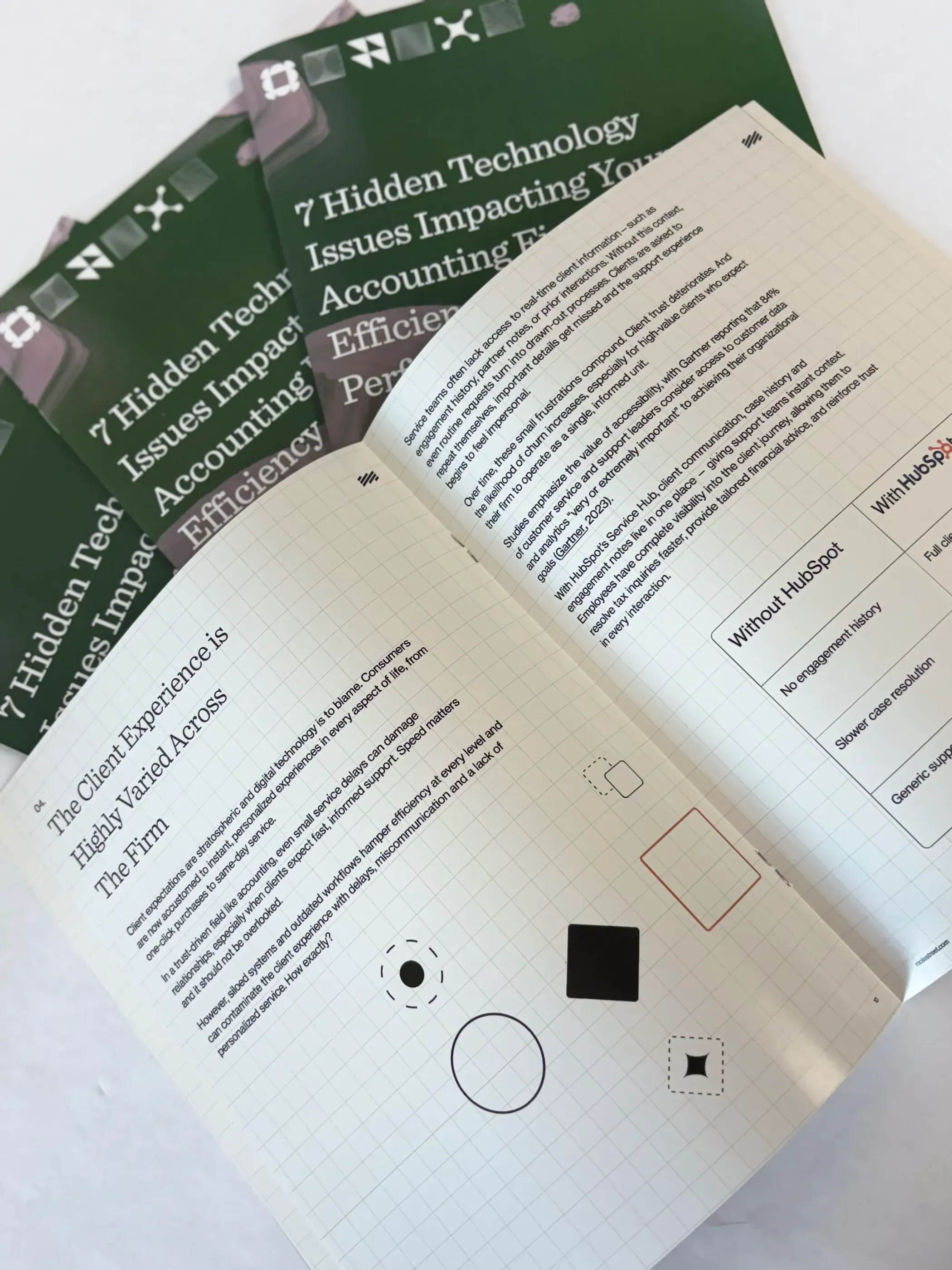 A close-up of an open booklet with grid-style layout and stylized icons, showing professional text content designed for accounting firms.