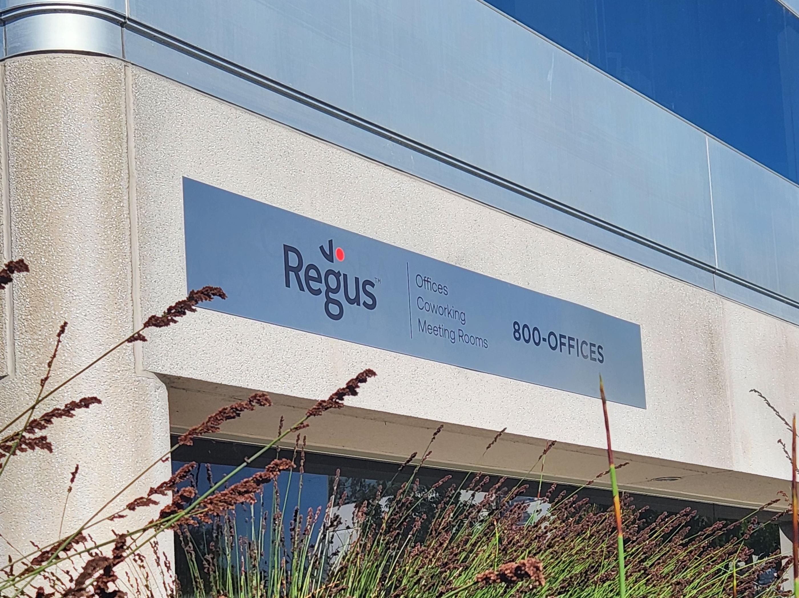 aluminum Building sign with black and red cut vinyl