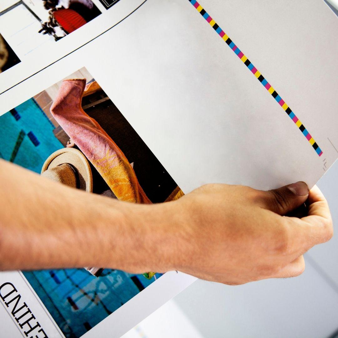 man holding print