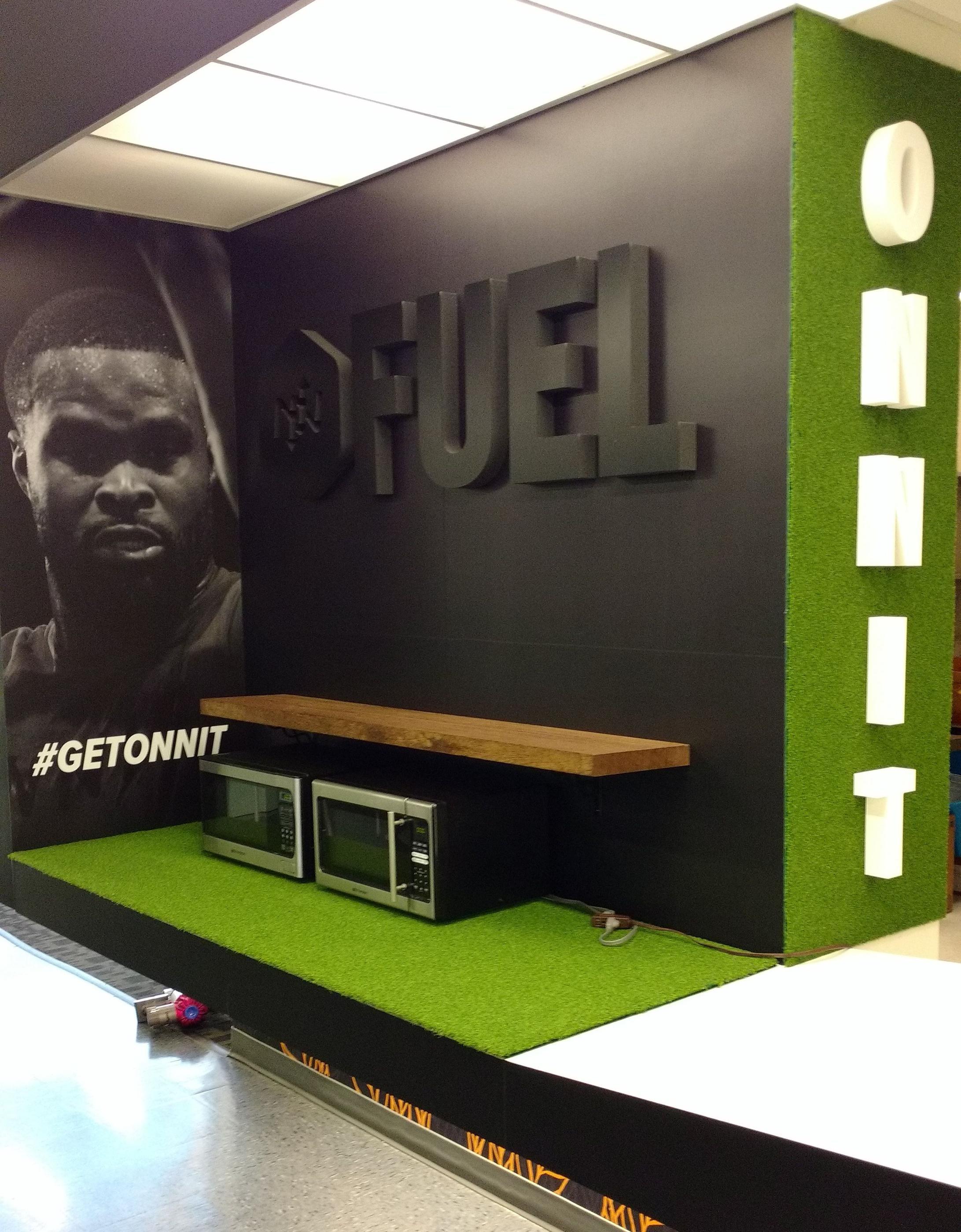 Custom display with dimensional lettering wall graphics diagonal crop
