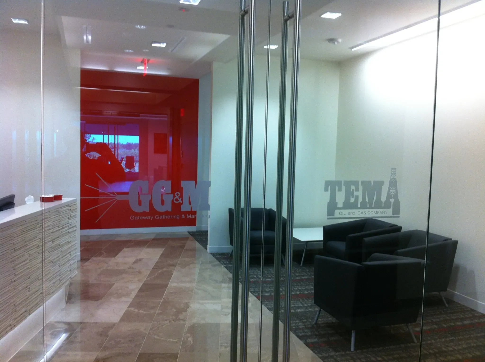 Frosted vinyl lettering on glass office walls