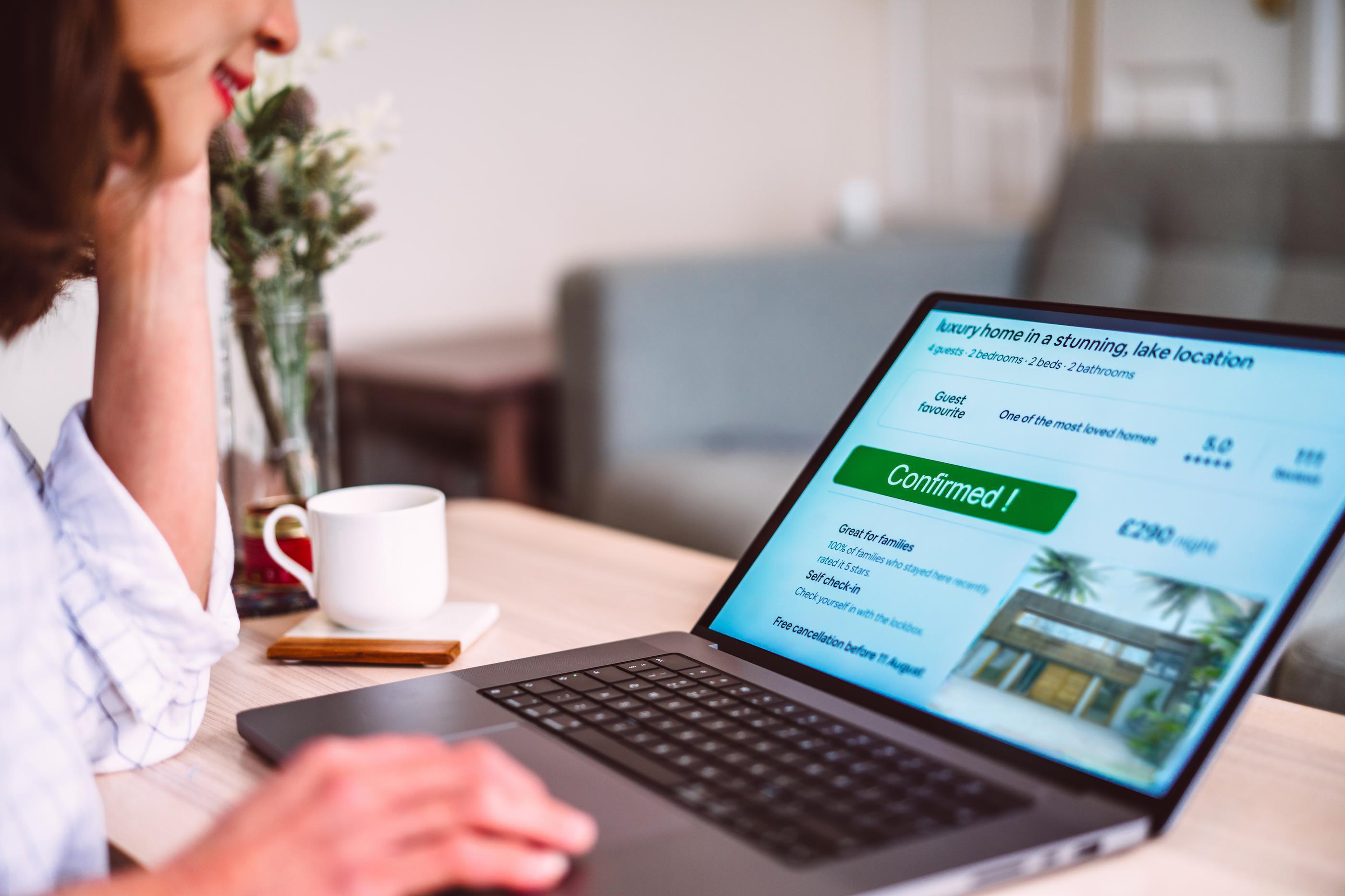 woman looking at laptop