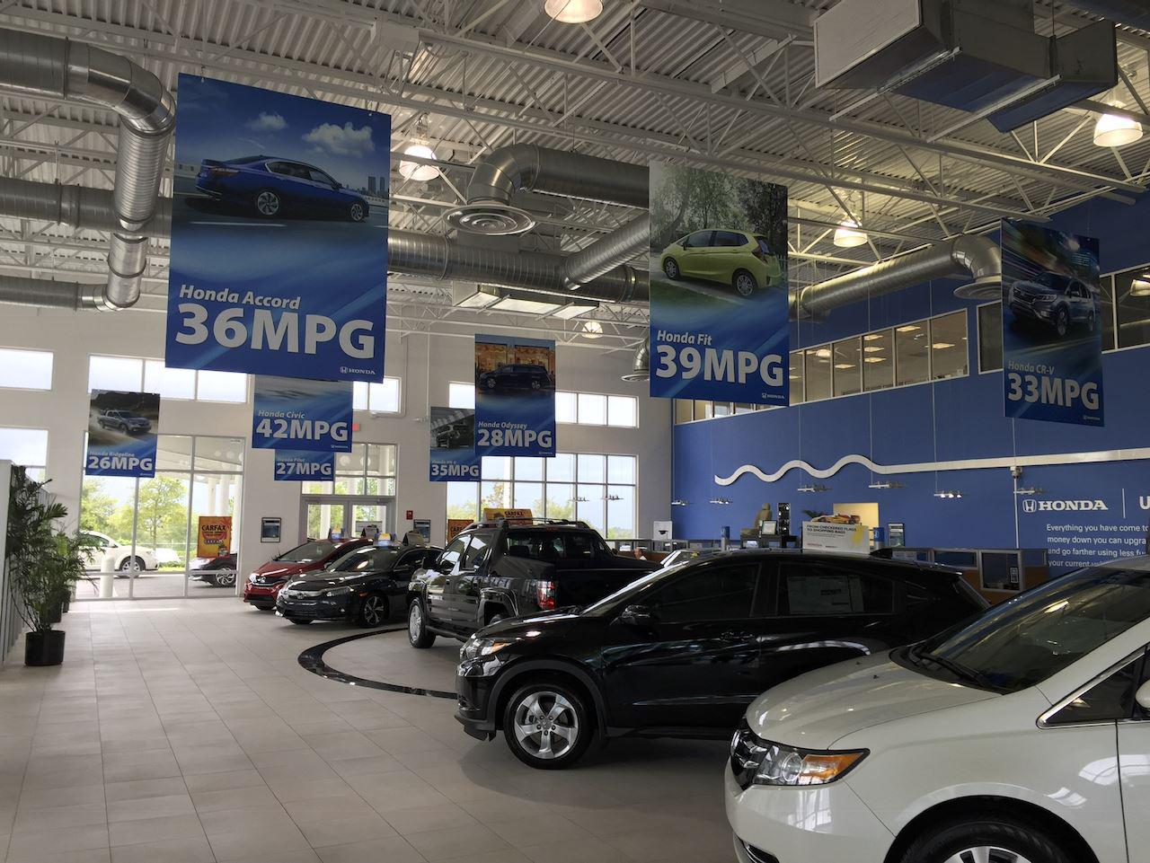 Hanging signs at a Honda dealership