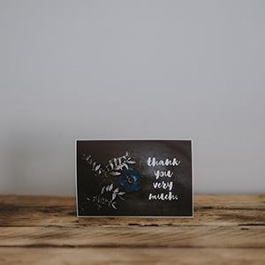 A thank you card on a table