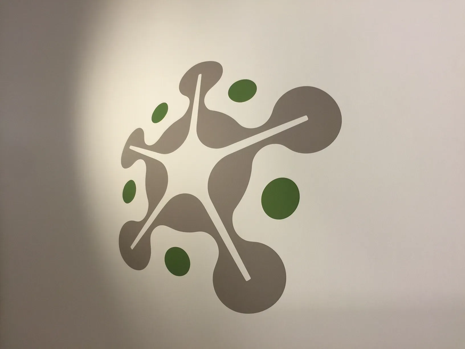 Cut vinyl logo graphic on a wall