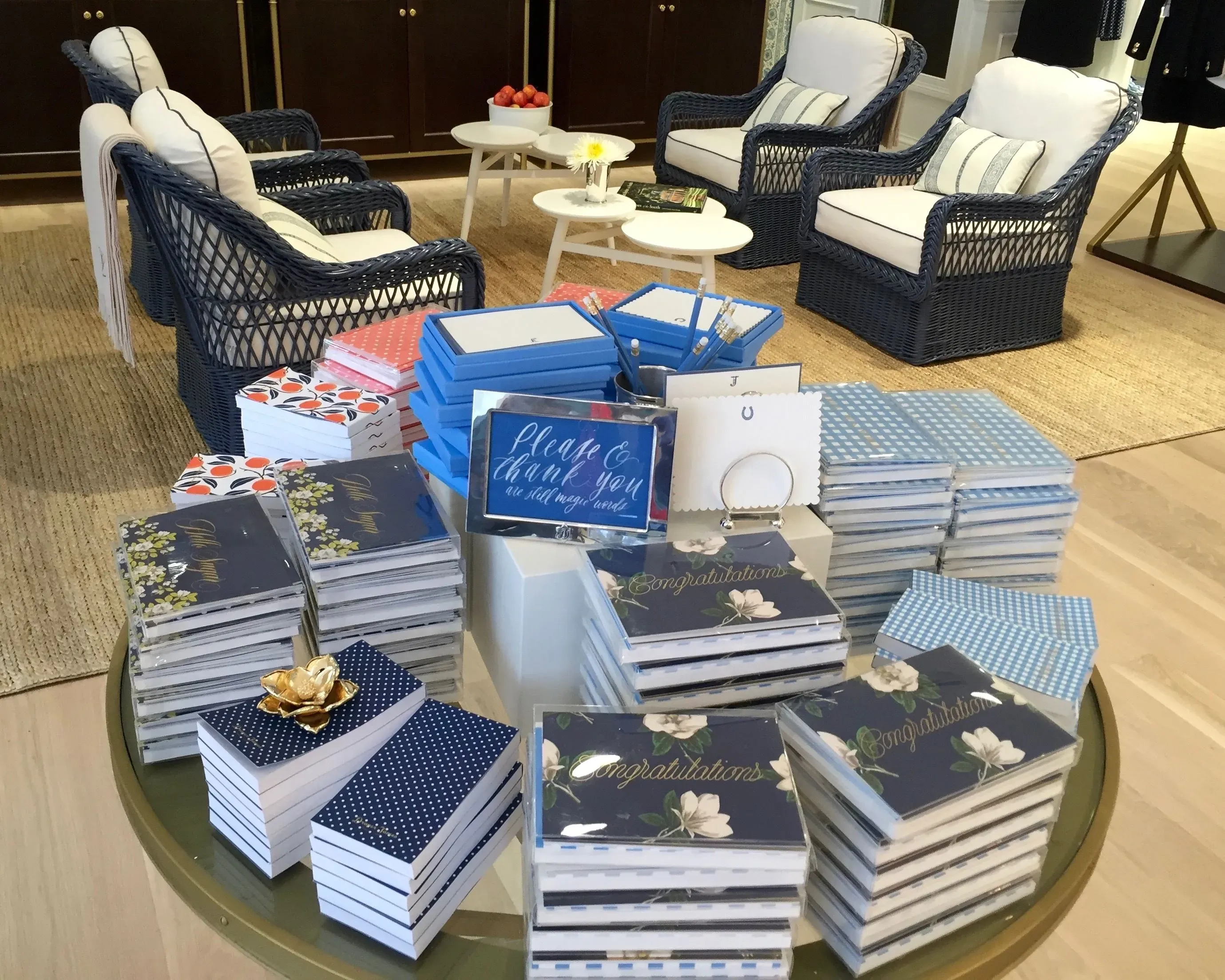 Stacks of printed books and boxes arranged for an event