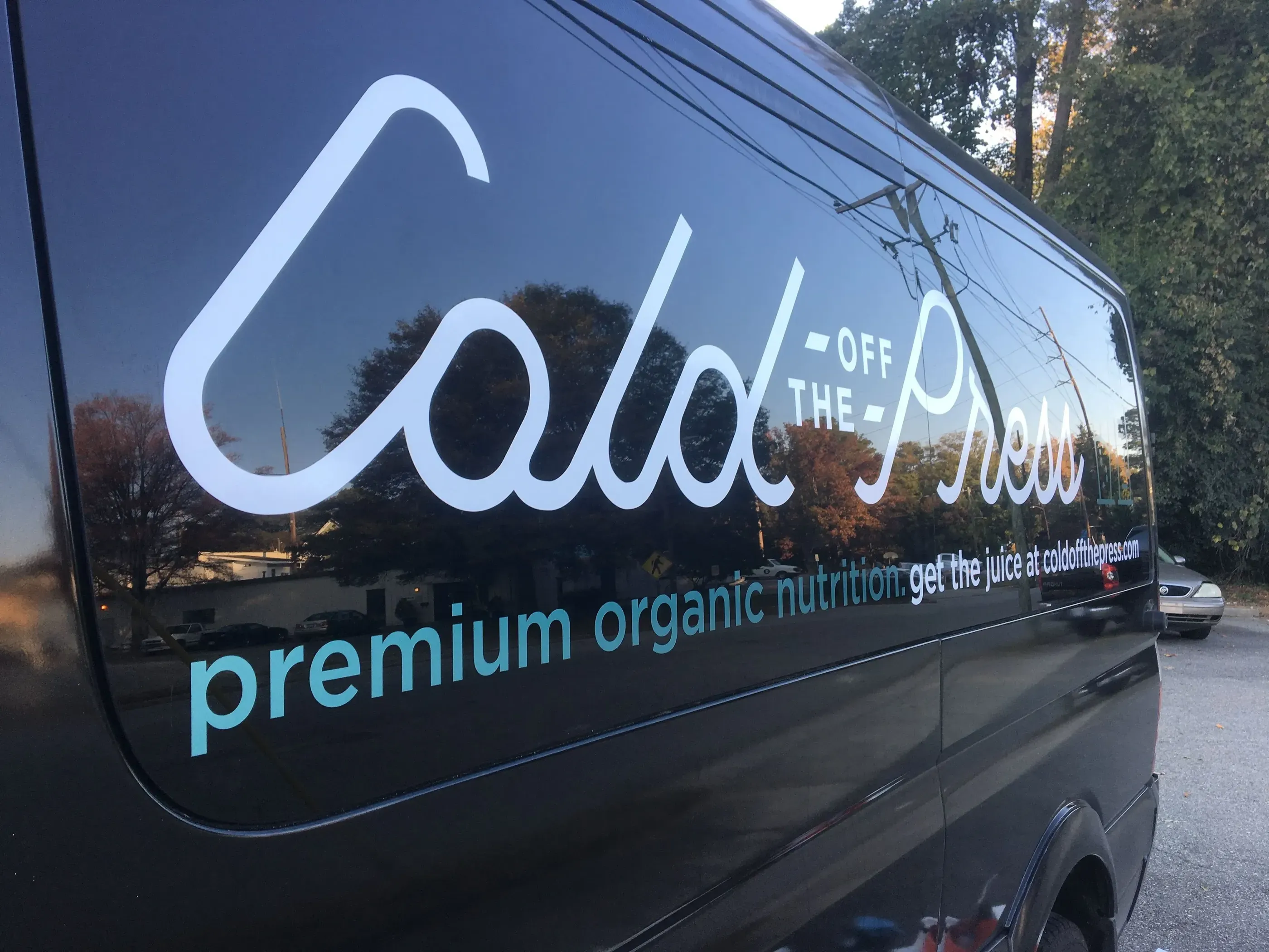 Van with cut vinyl lettering for an organic juice company