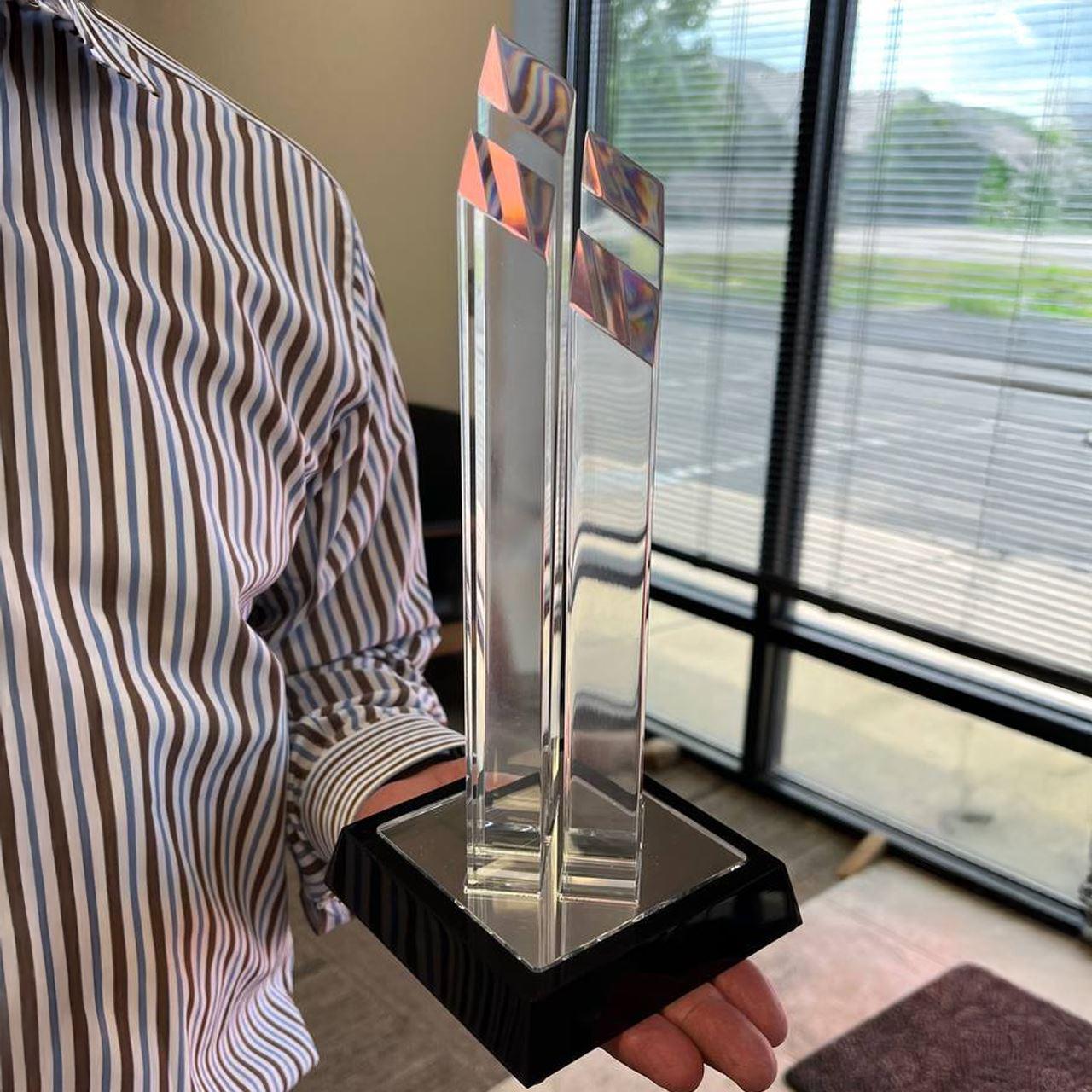 Elegant acrylic award on a black base