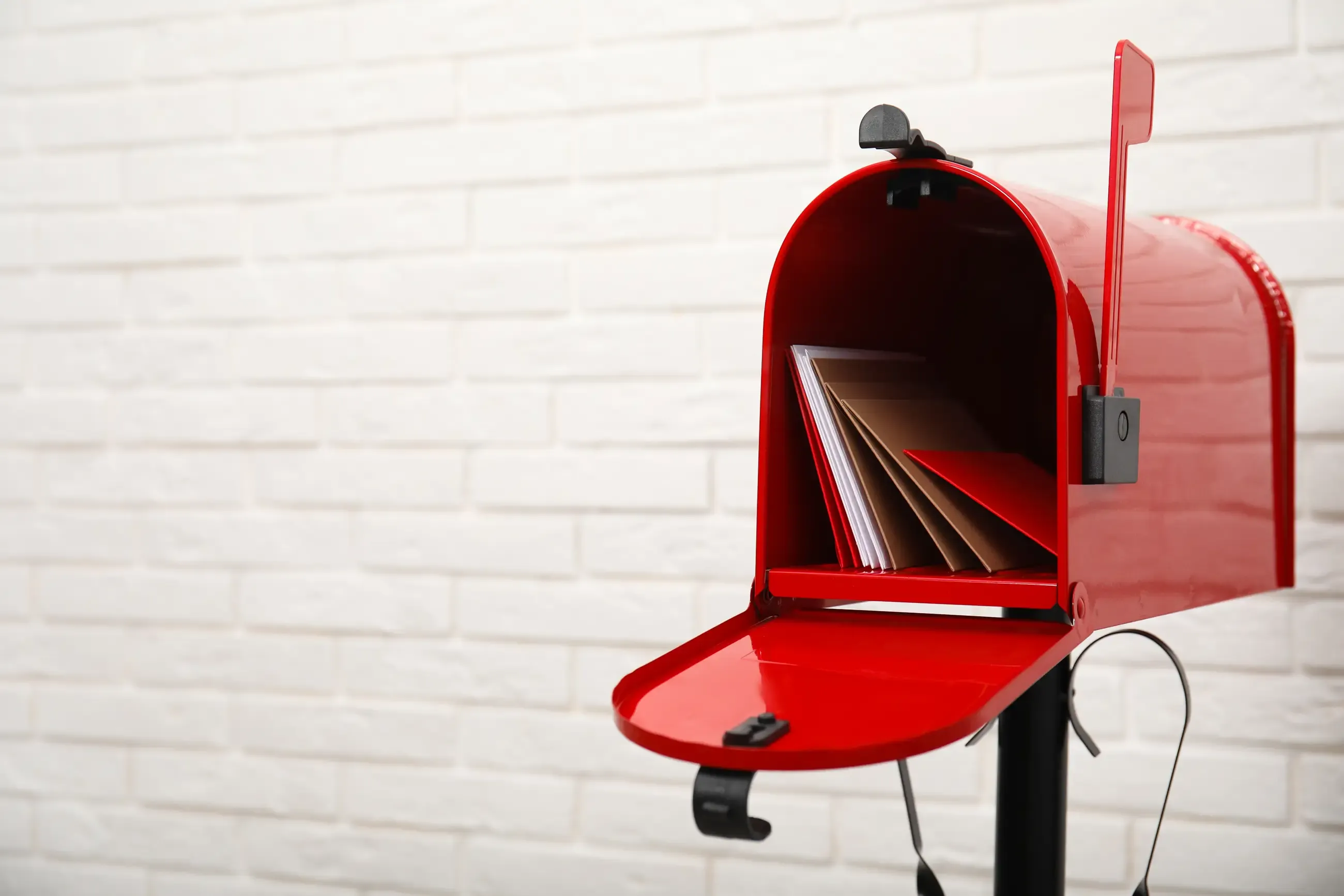 A open mailbox with mail inside
