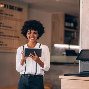 A business owner with a tablet