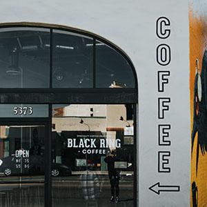 Wall and window graphics on the outside of a coffee shop