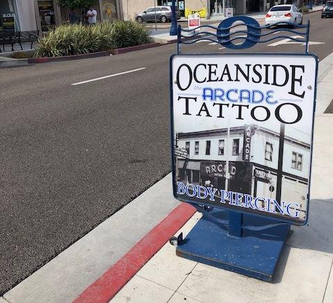 Pedestal Sign Oceanside Arcade Tattoo