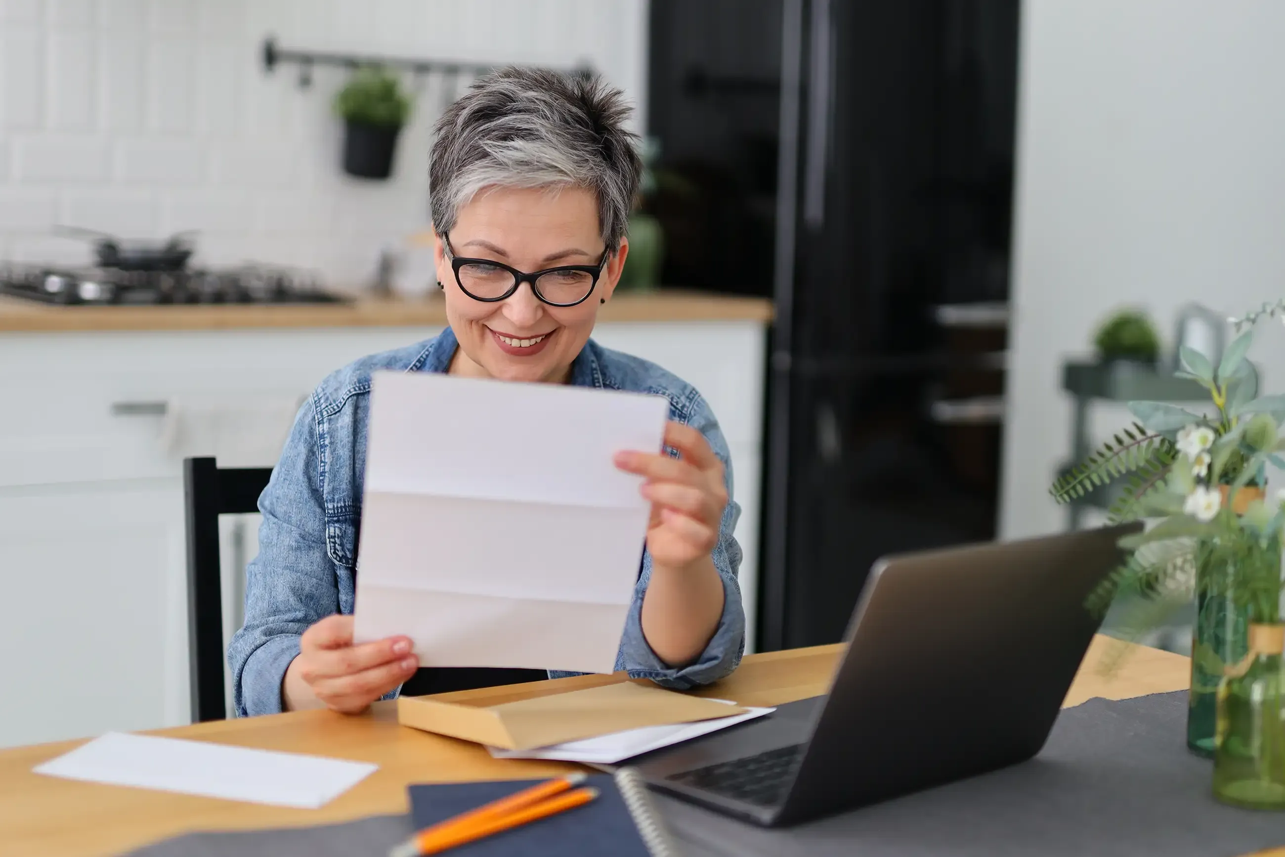 A woman reading a paper
