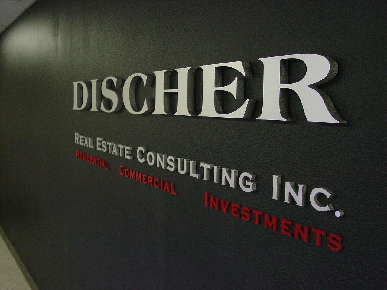 Dimensional foam letters with brushed aluminum laminate