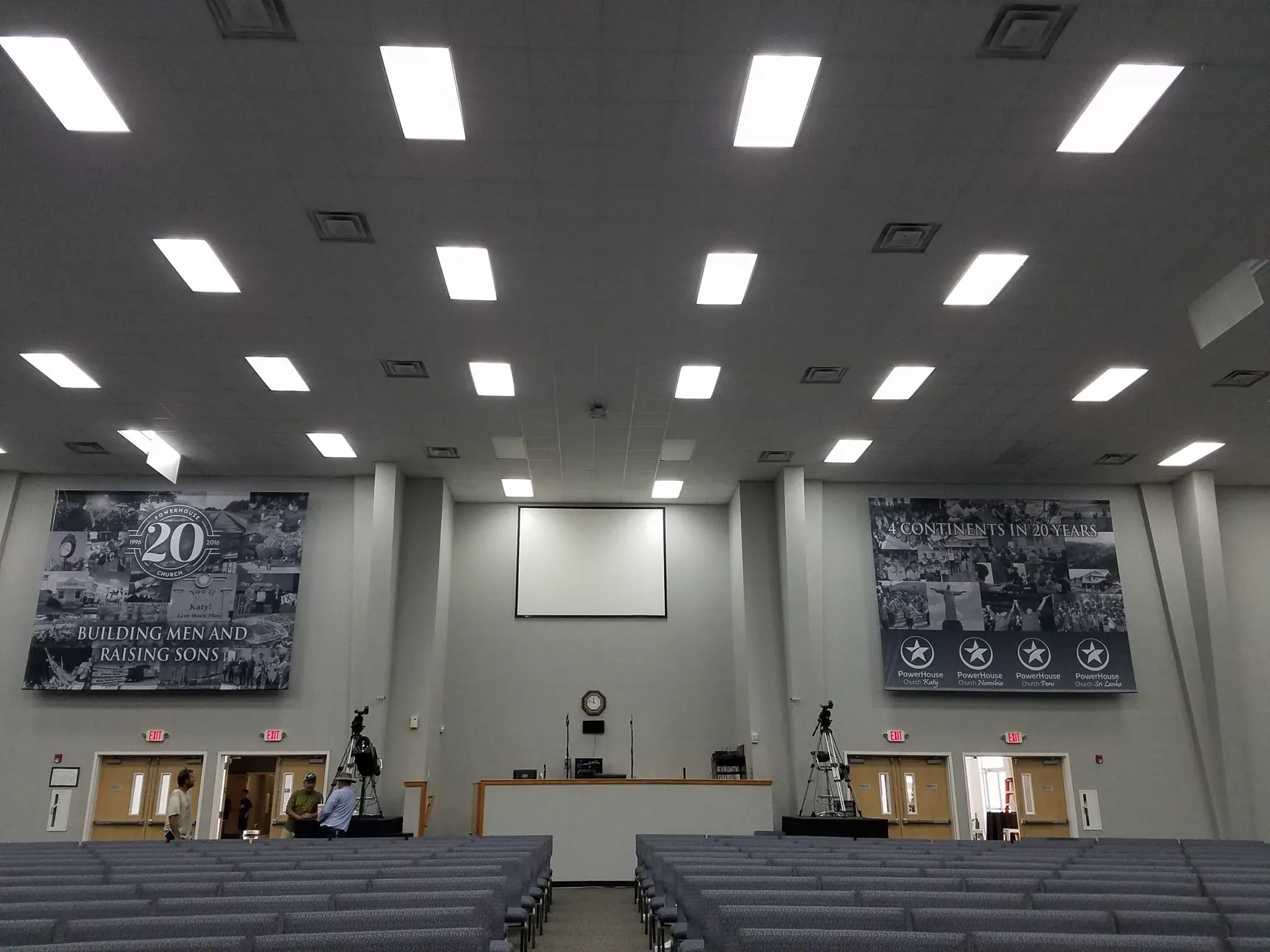 Large banners inside an auditorium