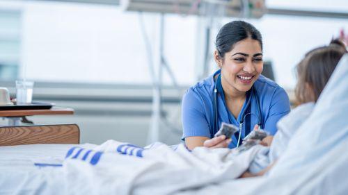 Nurse checking on patient