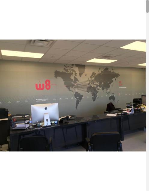 World map wall mural in an office