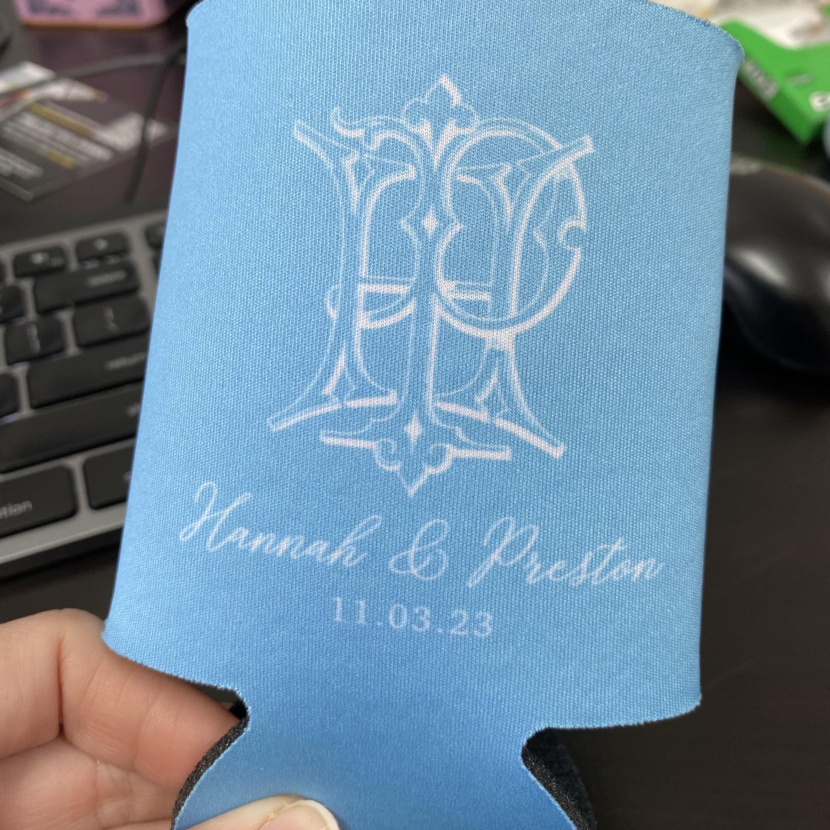 Light blue custom wedding koozie with a monogram