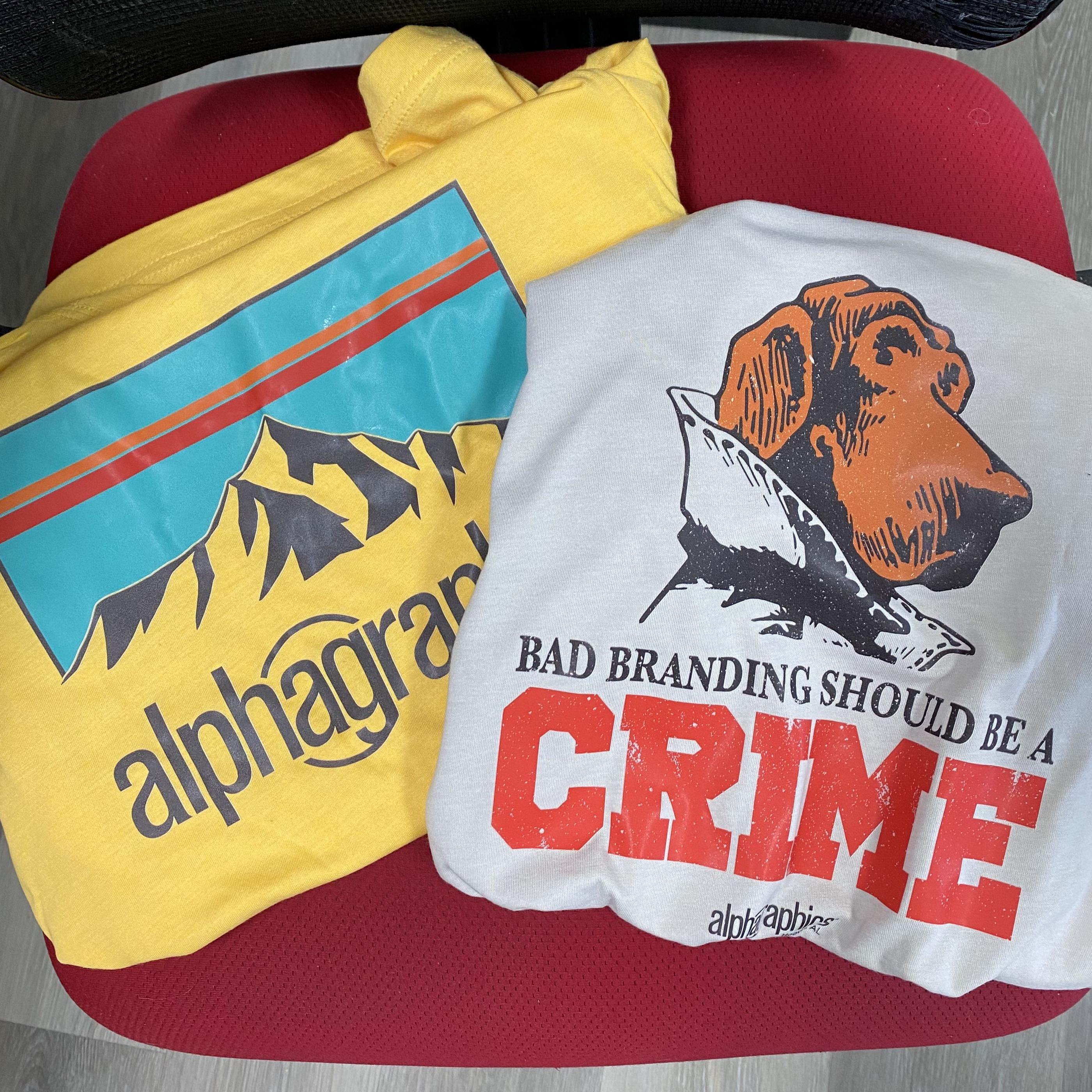 AlphaGraphics Hoover branded t-shirts in yellow and white