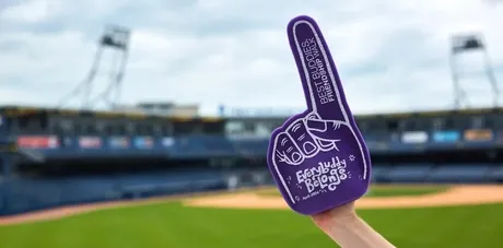 foam finger in a baseball stadium