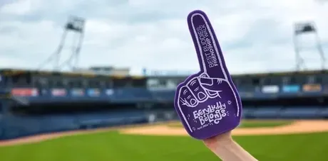 foam finger in a baseball stadium