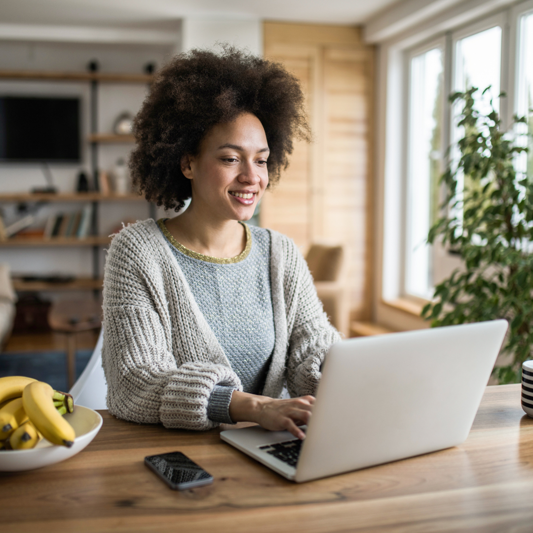 woman looking at computer