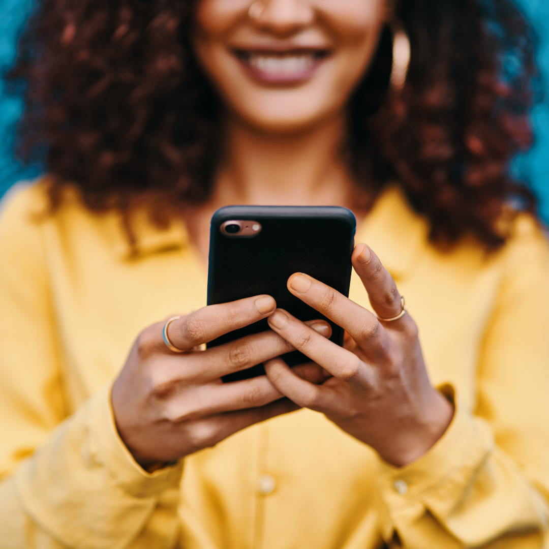 woman holding phone