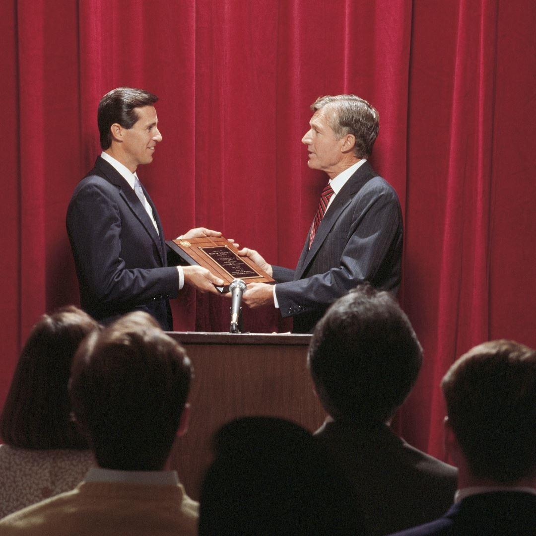 Man receiving an award