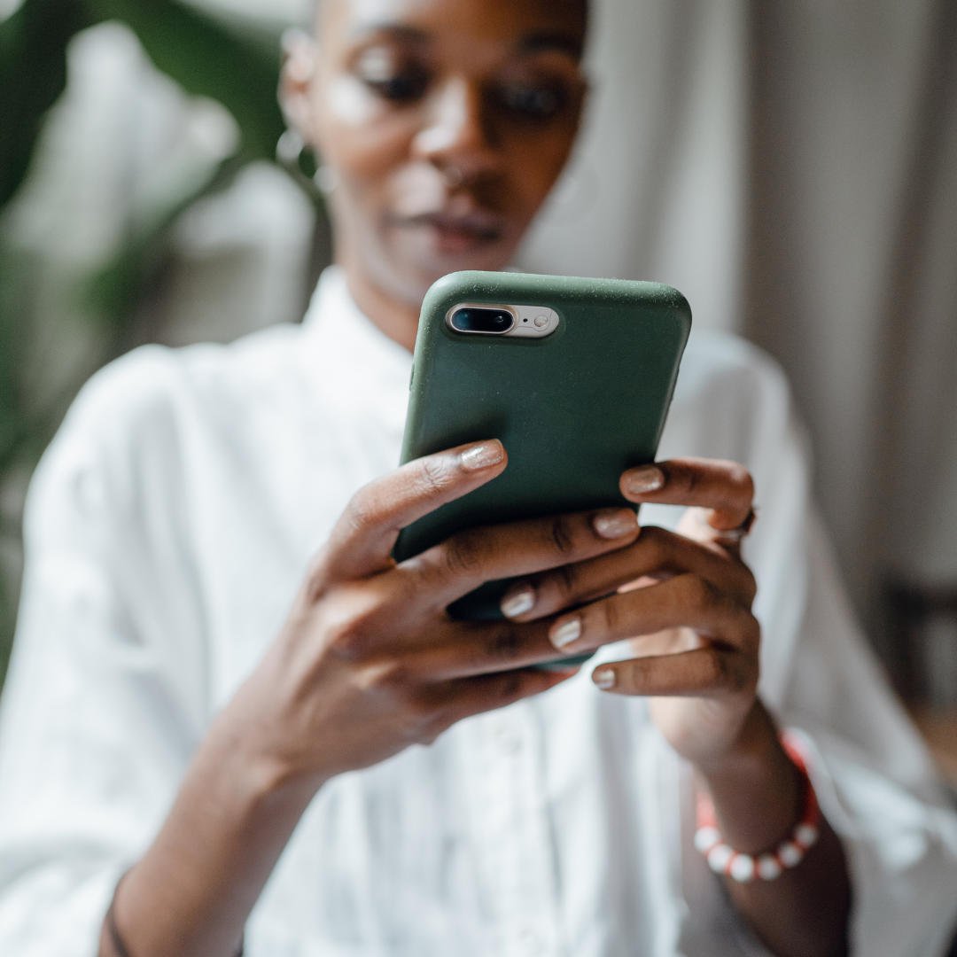 woman looking at phone