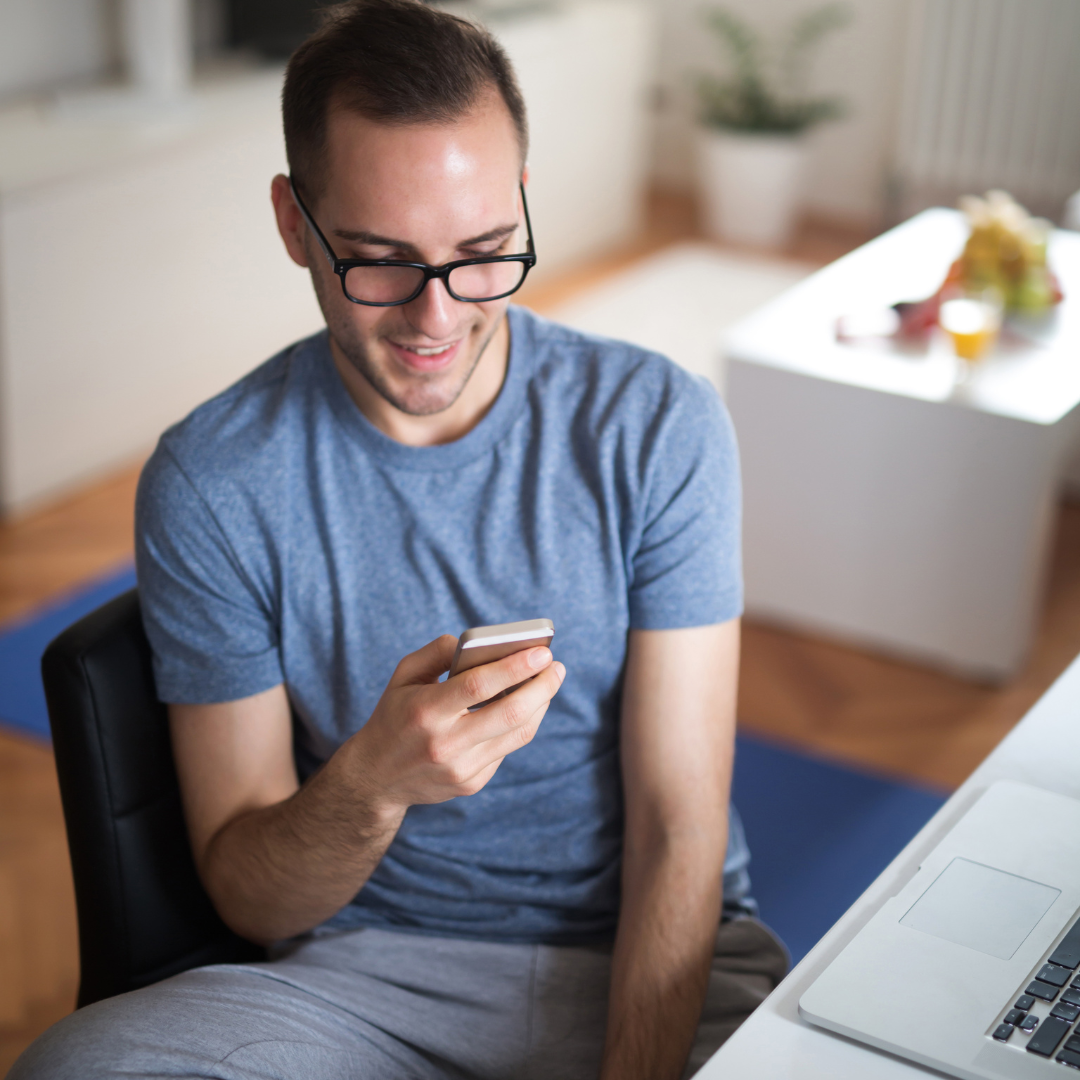 man looking at his phone