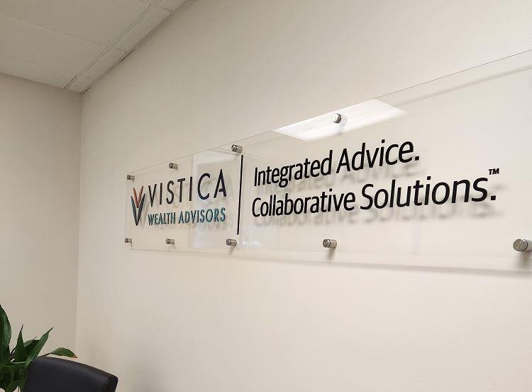Raised lettering on clear acrylic for indoor sign