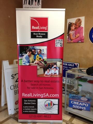 Real living trade show banner