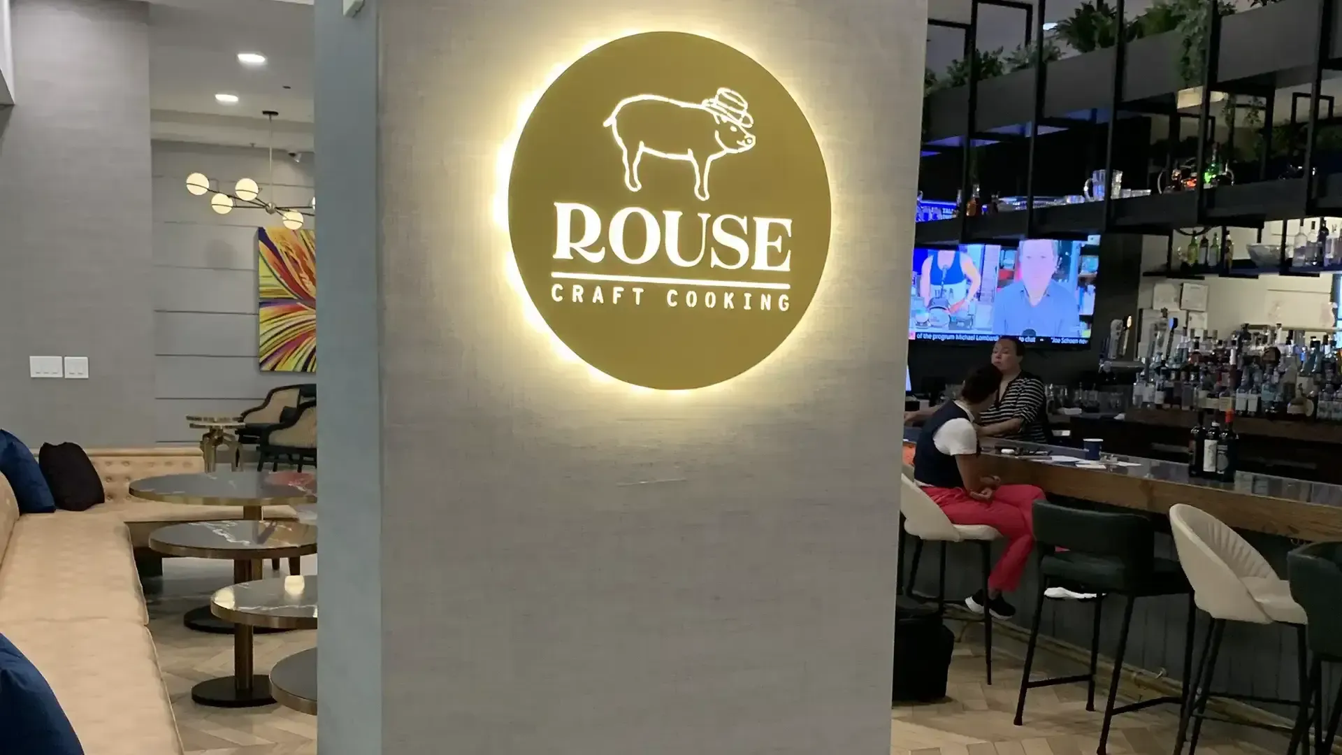 Restaurant signage at AlphaGraphics Houston Galleria