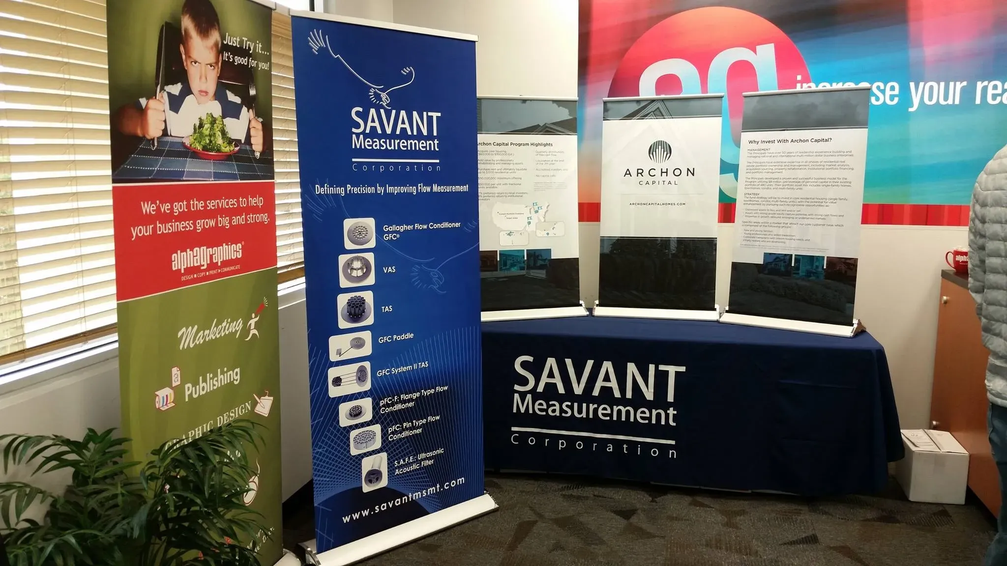 Retractable banners at a trade show booth