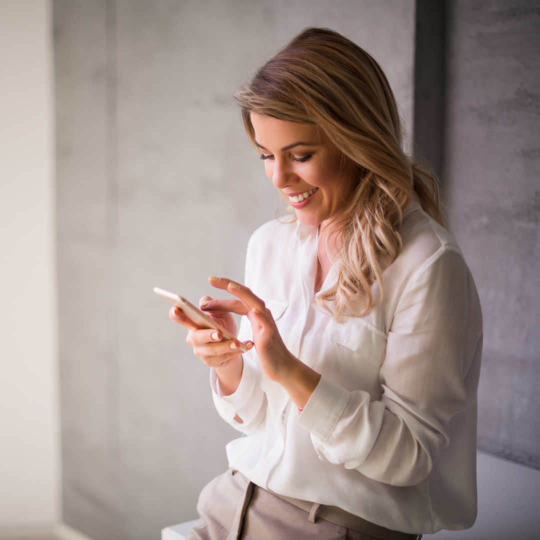 woman looking at phone