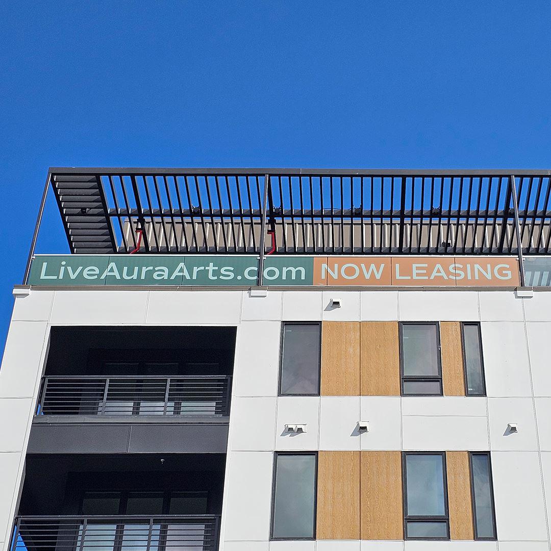 Wide-format banner on leasing office