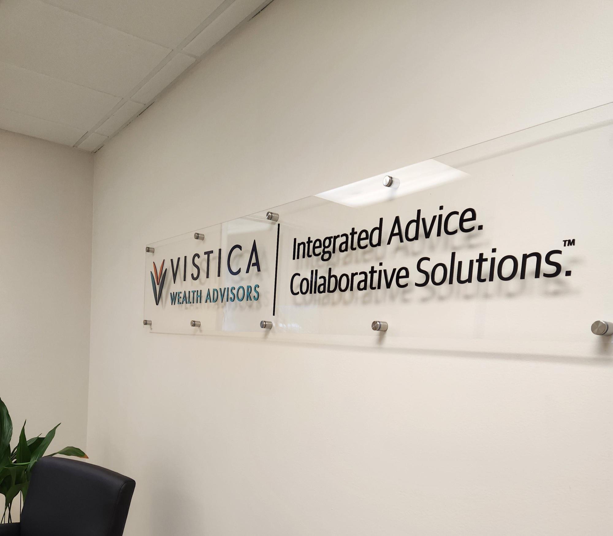 Raised lettering on clear acrylic for indoor sign