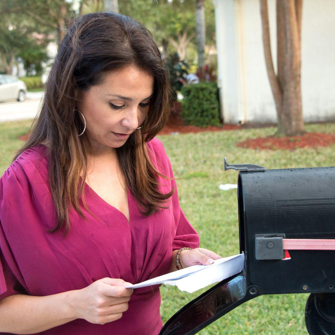 woman looking at her mail