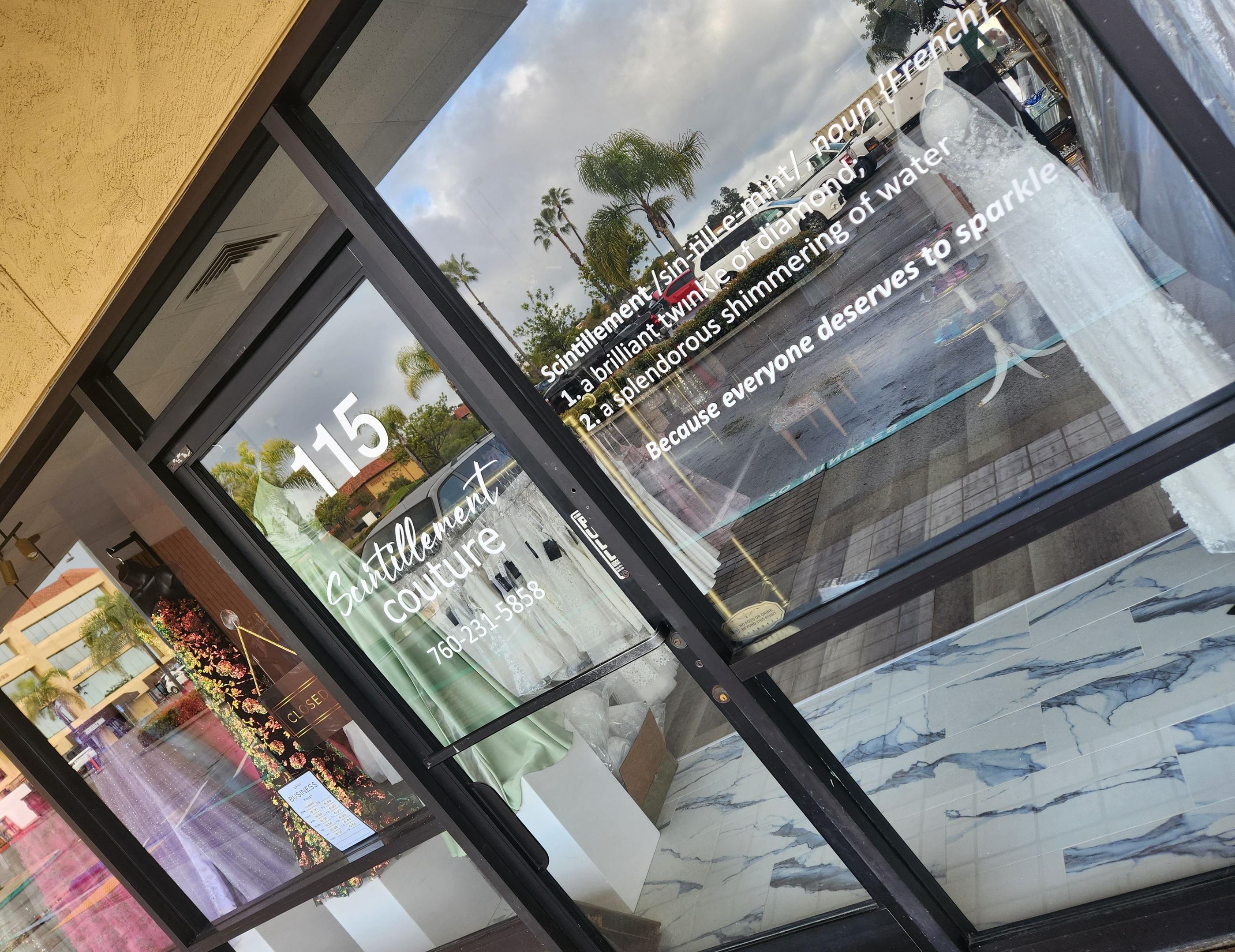 White cut vinyl window graphics for business frontage windows